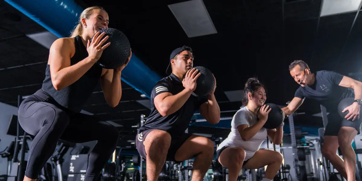 A group of men and women participating in a Group Fitness class at Christchurch Recreation and Sport.