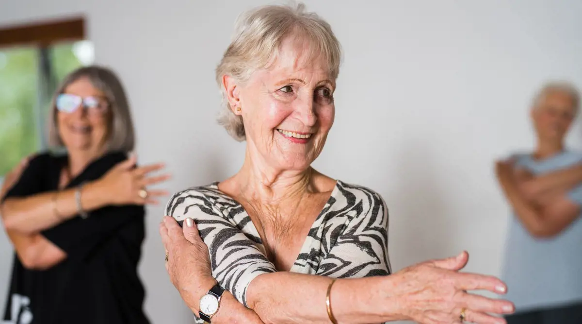 A group of women participating in a gentle yoga class at Christchurch Recreation and Sport.